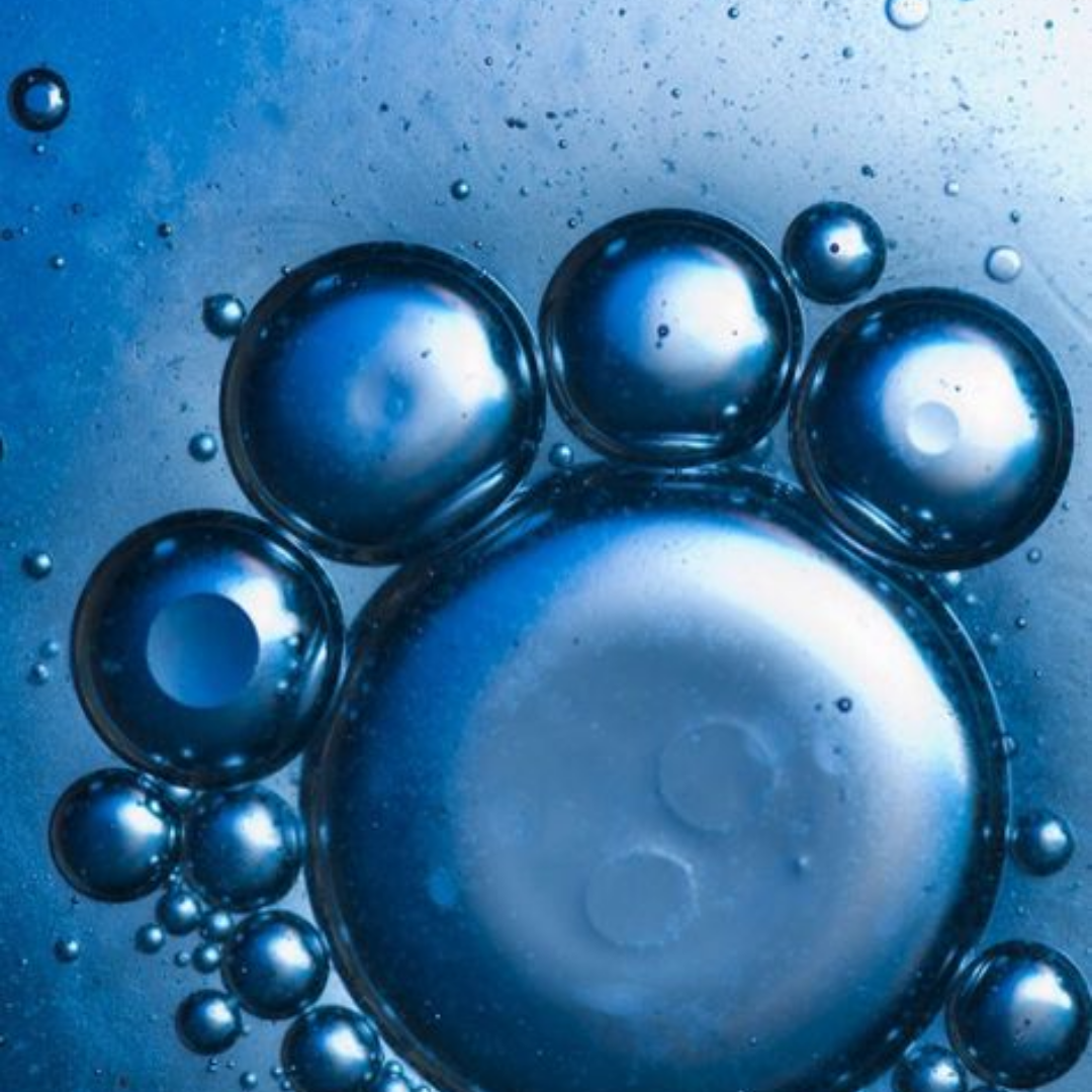 Many blue bubbles on a blue background.